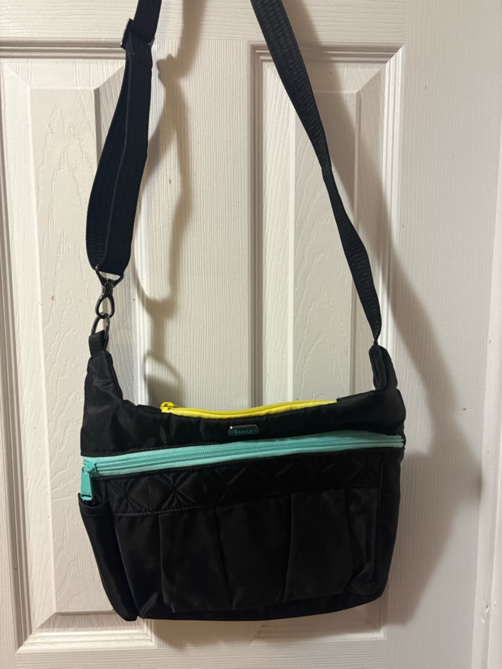 Black Lug Swing Crossbody Bag with Mint and Yellow Zippers